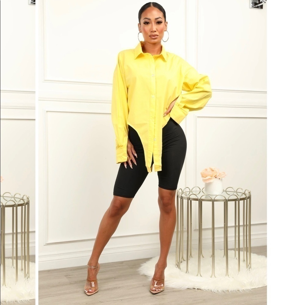 Long sleeve button-up crop top. Cropped v cut at the waist line. Yellow. (L) NWT